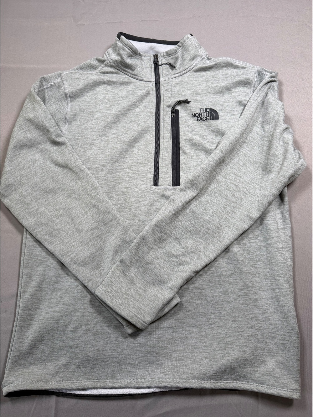 The North Face light gray quarter-zip fleece pullover